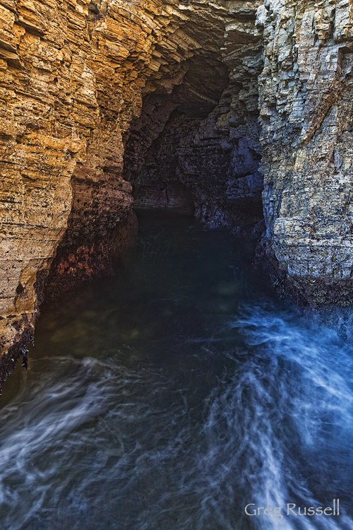 Montaña de Oro 1 Waves rushing into a sea cave at Montaña de Oro
