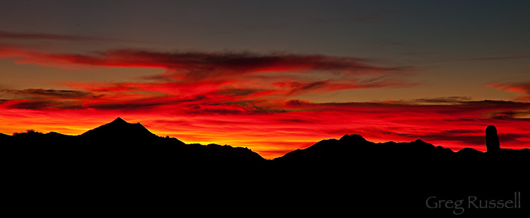 fiery, dramatic sunset at south mountain park, near phoenix arizona