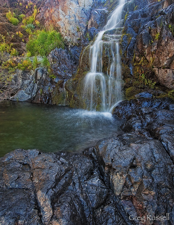 image of the colorful rocks at upper hot springs falls in the santa ana mountains of southern california