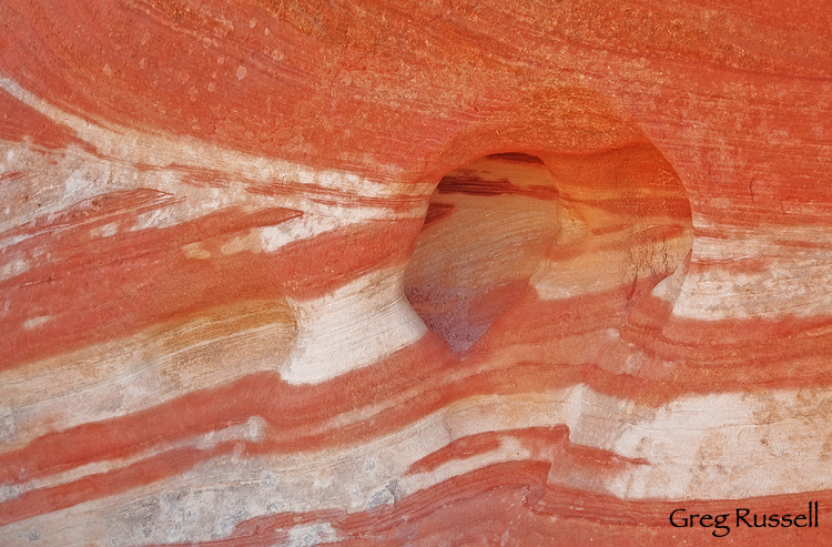 abstract image of a color sandstone window in the paria river, southern utah