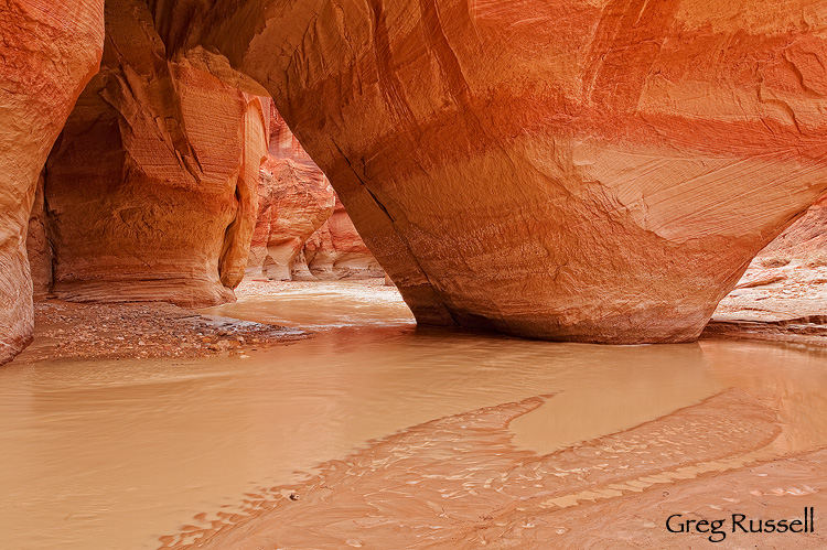 Sliderock arch is found near the confluence with Buckskin Gulch on the Paria River in southern Utah