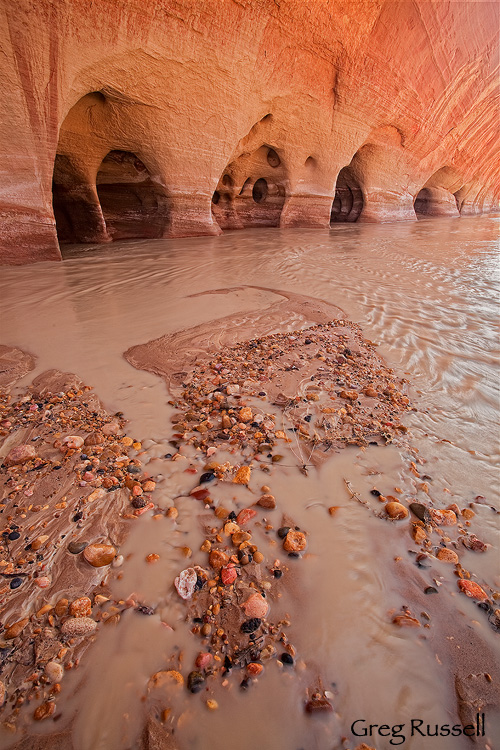 Sandstone windows carved by water and wind alond the Paria River in southern Utah