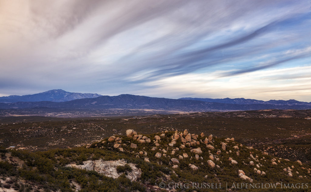 Photograph of San Jacinto Peak underneath dramatic ominous storm clouds.