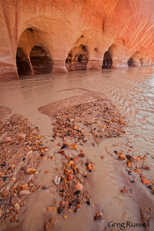 Sandstone windows carved by water and wind alond the Paria River in southern Utah