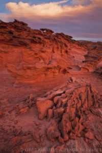 photo of a colorful sunset and clouds over the little finland region of gold butte national monument, nevada