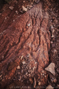 photo of eroded hillside with debris in the Mojave Desert, Nevada