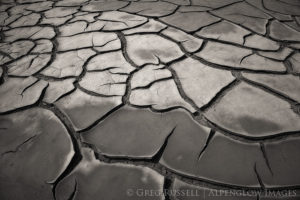 Large, cracked mud tiles in largo canyon, northwestern New Mexico